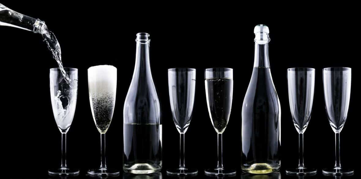 Champagne glasses on a black background