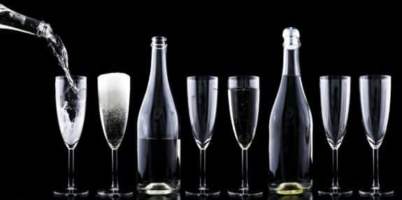 Champagne glasses on a black background